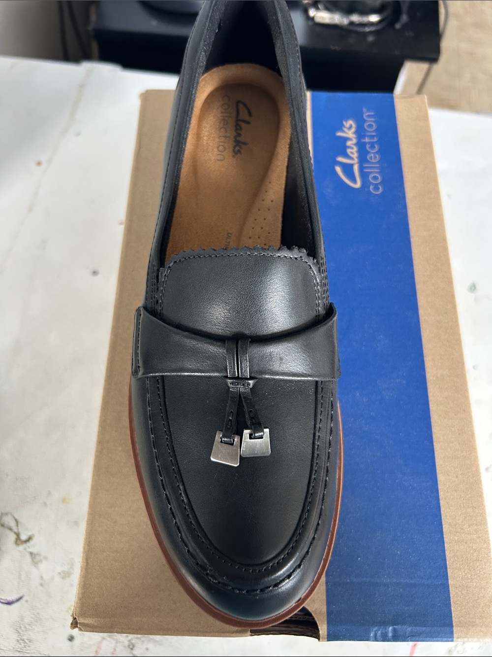 Clarks Black Leather Tassel Penny Loafer with Brown Sole